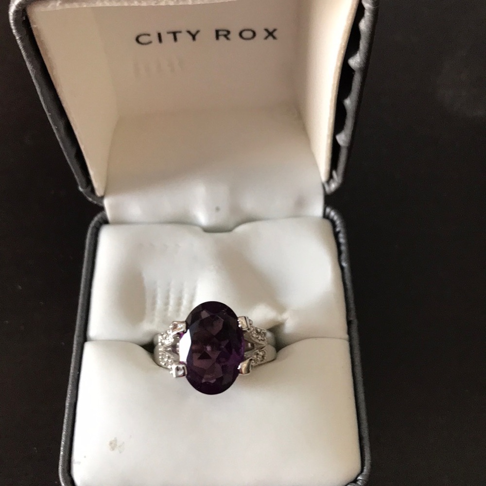 Silver and purple stone ring